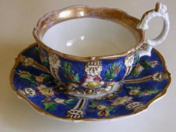 Cup with plastic decoration Cup with plastic decoration