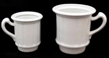 Large and smaller cup with strainer Large and smaller cup with strainer