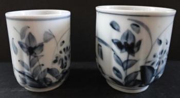 Larger and smaller porcelain cup for sake